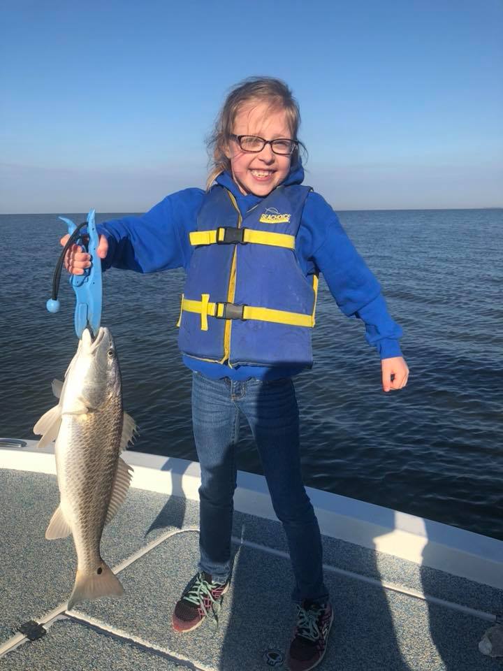 Junior Angler Catches Redfish.